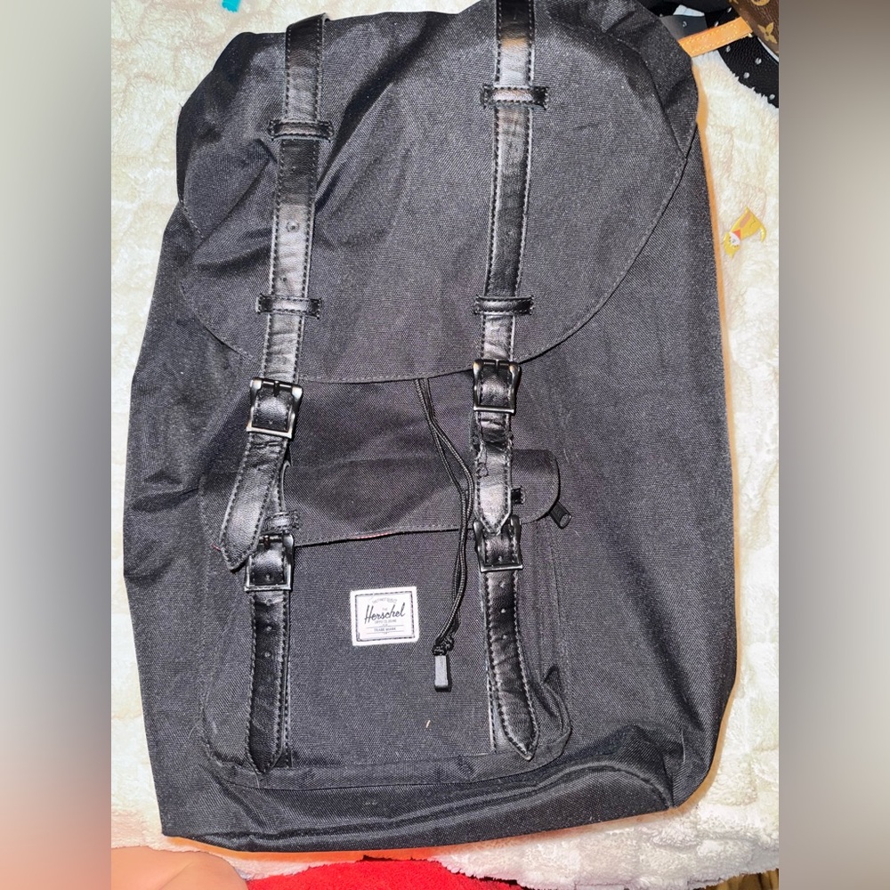 Herschel backpack ! Sold as in some wear on front strap